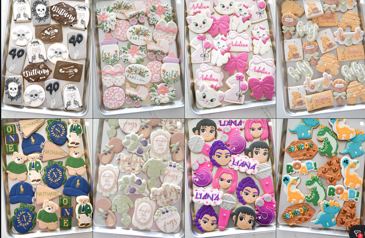 Pink floral baby shower cookies with bottles and bows